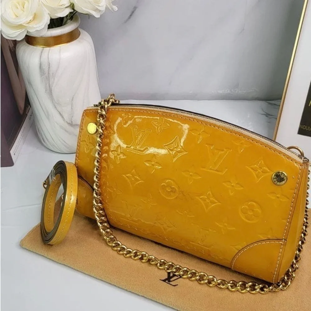 𝅺louis VUITTON VERNIS STA. MONICA CLUTCH